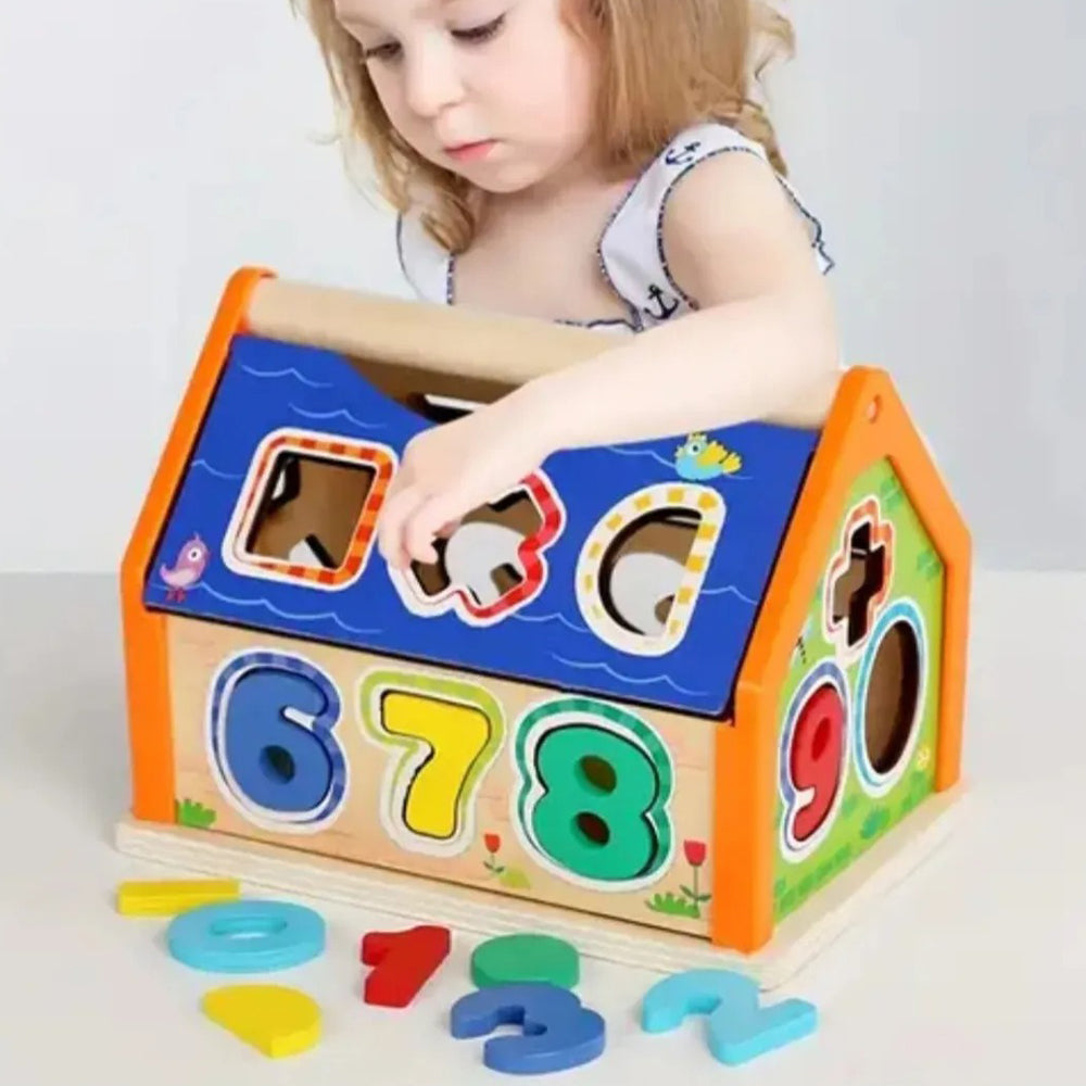 Wooden Interlocking Toy House With Numbers Geometric Shapes And Signs