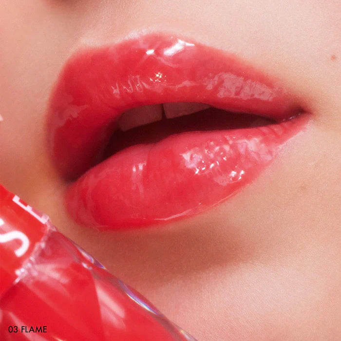 SEPHORA COLLECTION
Outrageous Plump Intense Hydrating Lip Gloss. Color: 03 Flame - shimmer free cherry red