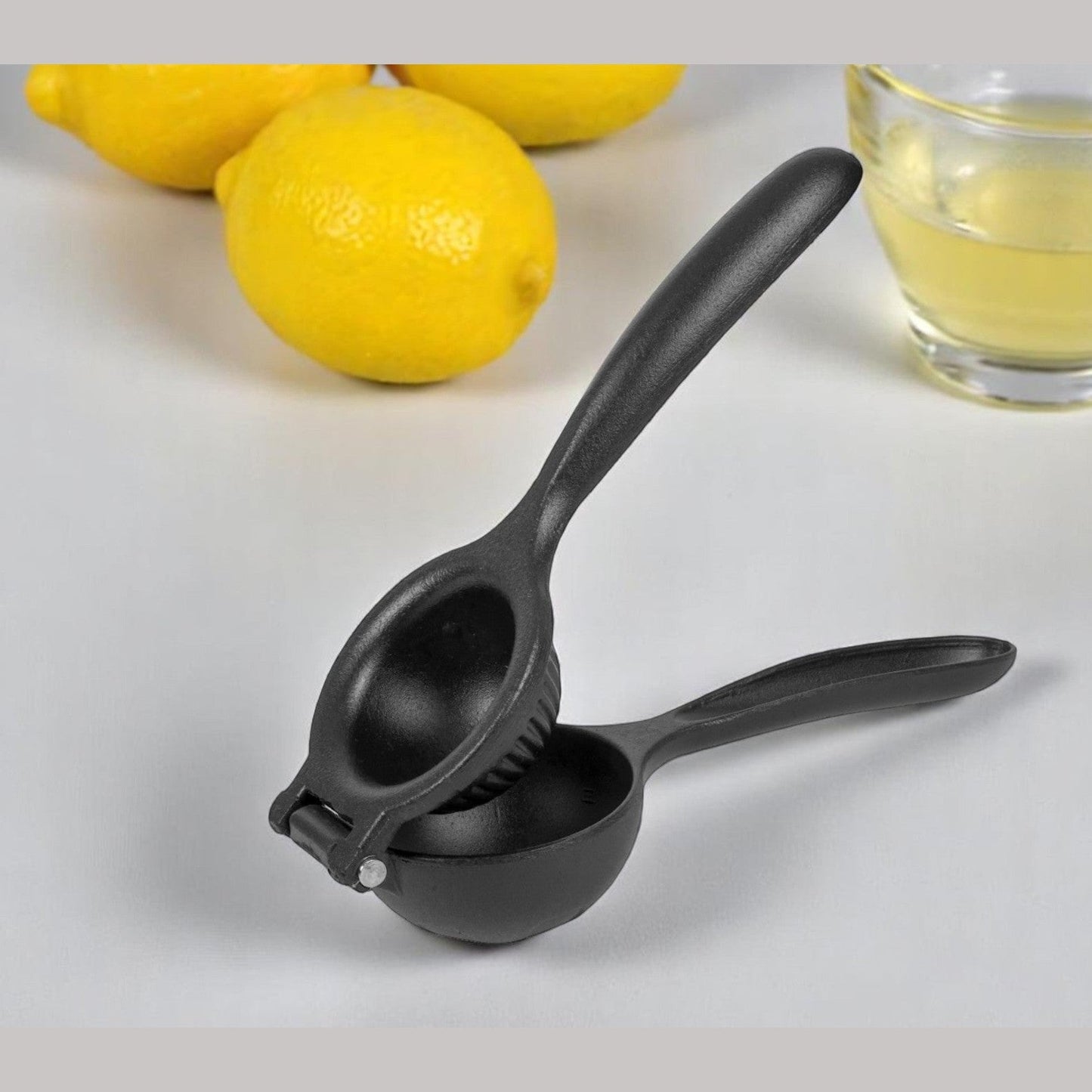 Black hand lemon squeezer