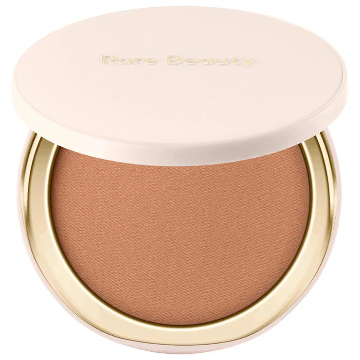 Rare Beauty by Selena Gomez 
Warm Wishes Soft Matte Powder Bronzer. Color: Warmed Up - light brown with neutral warm undertone