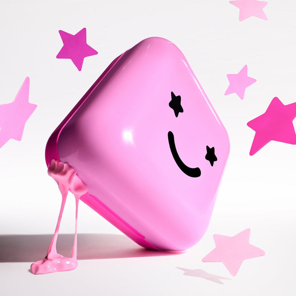 STARFACE hydro-stars® + big pink absorbs. shrinks. protects.  a cute pink  compact filled with 32 pink hydro-stars